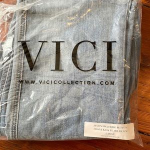 Jevon high rise button front kick flare denim